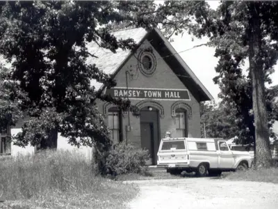 Small brick building with a gable roof Historic Town Hall
