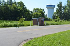 Water Fill Station Hut at Elmcrest with the Ramsey Water Tower behind it