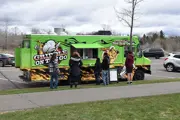Griddle on the Go Food Truck with people waiting to order